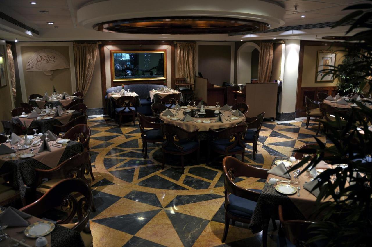 Hotel Ramada Plaza By Wyndham Palm Grove Bombay Exterior foto The restaurant